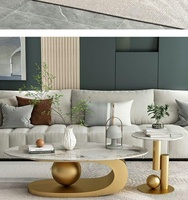 Table basse de luxe légère avec plateau en ardoise et structure en acier titane, vente en gros. Idéal pour les hôtels et les résidences haut de gamme.