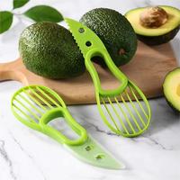3-in-1 avocado-snijder, -pitter en -lepel van plastic voor het snijden, pletten en scheppen van avocado's, mango's en peren