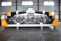 Máquina CNC de tallado de piedra rotativa de cuatro ejes estéreo y cabezales múltiples para cilindros