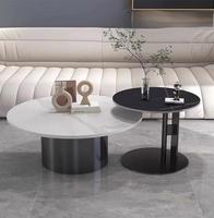 Table basse minimaliste au design épuré, plateau en pierre, structure en métal, table basse en acier inoxydable pour salon