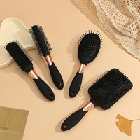 Kit de coiffure professionnel pour hommes Q378 en polypropylène plaqué or noir, six pièces, avec teinture pour cheveux et peigne de coiffage