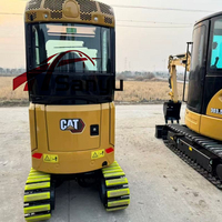 Mini-excavatrice Cat d'occasion avec chenilles en caoutchouc, poids opérationnel de 2 tonnes, godet de 0,04 m³