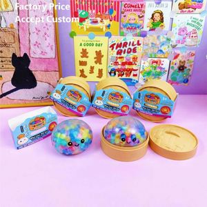 Vente en gros usine : Jouet sensoriel anti-stress TPR Squishy en forme de boulette avec visage souriant, Boîte mystère surprise à paillettes pour adultes - Product Image 1