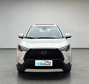 Le SUV le plus vendu et le plus économique, <span class=keywords><strong>Toyota</strong></span> Corolla <span class=keywords><strong>Cross</strong></span> 2024 2.0L CVT Pioneer Edition, présente un intérieur luxueux et sombre. - Product Image 1