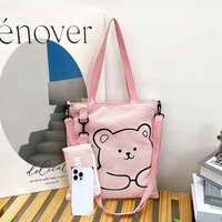 Élégante trousse à crayons en toile avec sangle et fermeture éclair, style frais et doux, sac bandoulière polyvalent pour femme, collection Hiver 2024