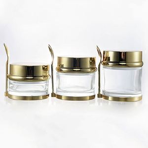 Envase Cosmético de Vidrio Transparente y Plateado Ecológico de Lujo de 30 ml, 50 ml y 80 ml, Crema Facial para el Cuidado de la Piel, Base de Plástico, Cuchara, Impresión Serigráfica - Product Image 1