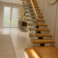 Escalier flottant en bois avec panneaux de verre, monopoutre, marches cantilever, pour intérieur résidentiel, design moderne