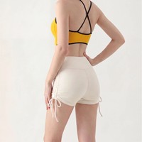 Shorts de yoga best-sellers pour femme, effet ventre plat, en Spandex/Nylon, motif uni, sans coutures apparentes, design ultra-confortable, avec cordon de serrage
