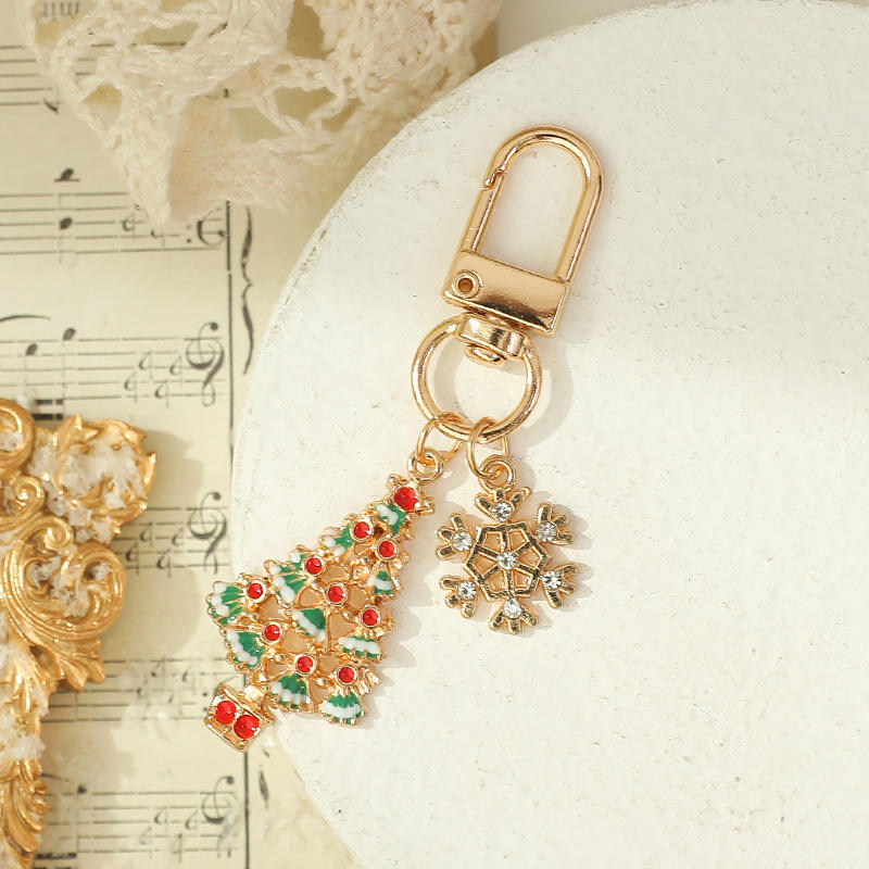 พวงกุญแจโลหะคริสต์มาส-ต้นคริสต์มาสและเกล็ดหิมะ