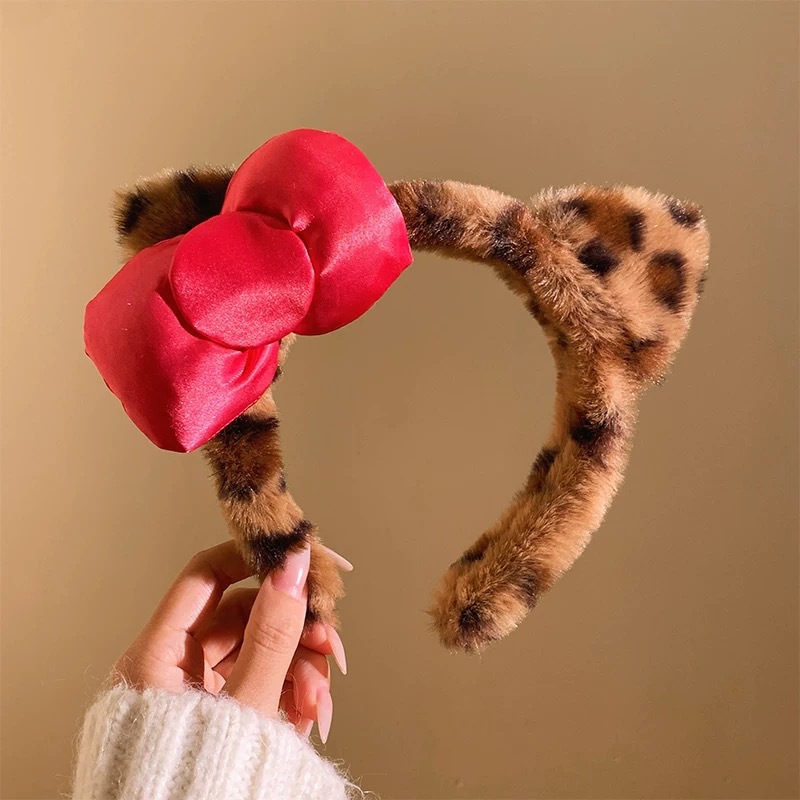 Serre-tête oreilles de chat avec nœud rose