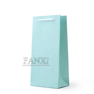 โรงงานผลิตกระเป๋าถือกระดาษลายหนังสีเขียวแบบกำหนดเองจาก FANXI ประเทศจีน สำหรับบรรจุภัณฑ์เครื่องประดับและของขวัญ - Product Image 3