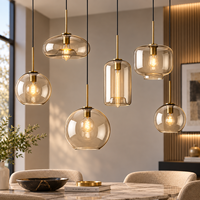 Luminaire suspendu en verre fumé moderne, lampe suspendue dorée nordique de luxe, éclairage décoratif de plafond pour la maison, l'hôtel et le restaurant