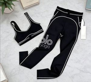 Set Yoga Pilates Aloe Spandex Desainer Khusus - Set Legging Yoga 2 Potong Wanita Berkualitas Tinggi, Elastis, Tanpa Jahitan, dan Bertekstur Rib - Product Image 1
