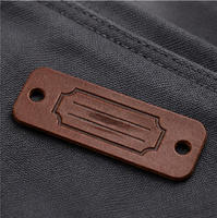 Étiquettes en cuir gravées au laser et gaufrées pour vestes en jean, patchs en cuir PU embossés à chaud pour l'image de marque des vêtements