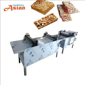 Peanut cereal nougat bar cutter/almond toffee cube cutting machine/sesame candy bar cutting machine