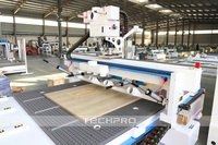 Routeur CNC TechPro 9 kW à double broche Syntec ATC, haute précision et excellent rapport qualité-prix, pour le perçage de portes d'armoires de cuisine