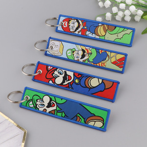 Promotionnel mignon imprimé dessin animé Anime broderie porte-clés tissé tissu étiquette Jet Tag broderie porte-clés - Product Image 4