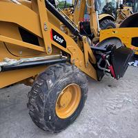 Chargeuse-pelleteuse CAT 420F d'occasion, 4 roues motrices d'origine, bon état de fonctionnement, pour travaux de construction et de réparation routière, prête à être expédiée