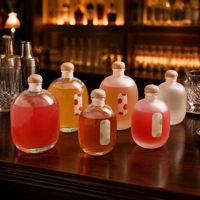 Bouteille à spiritueux ovale en verre borosilicate, forme galet, luxe unique, pour gin et whisky, base lourde avec sérigraphie intégrée