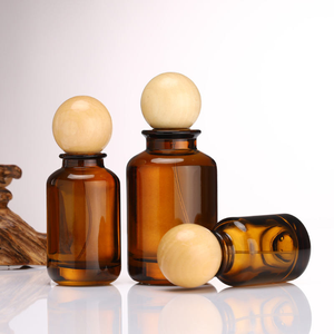 Botella de Perfume Redonda de Vidrio Ámbar de Lujo Vacía de 30 ml, 50 ml, 100 ml con Tapa de Bola de Madera - Product Image 2