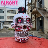 Crâne géant gonflable pour le Día de los Muertos, crâne avec chapeau pour la décoration du festival d'Halloween, crâne en sucre peint aux fleurs