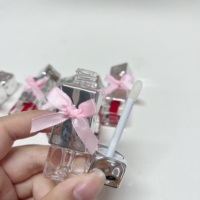 Gloss à lèvres mignon et adorable, tube étanche, effet brillant intense, avec nœud et pierre argentée, personnalisable avec votre marque privée
