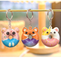 Vente en gros de jouets anti-stress en mousse PU à remontée lente de 2 pouces, en forme de beignet, pour enfants de 5 à 7 ans