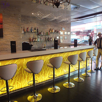 Comptoir de bar de casino en forme de L avec éclairage LED à changement de couleur personnalisé, design esthétique et nouveau