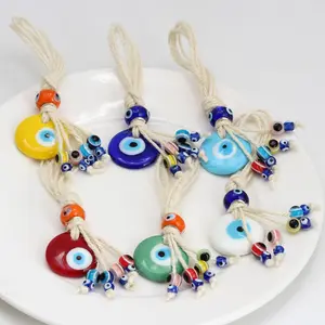 Kingcome, nueva cuerda trenzada, colgante de ojo del <span class=keywords><strong>diablo</strong></span>, ojos azules de pavo, amarillo, blanco, ojos malvados, colgante de cuerda de cáñamo - Product Image 1
