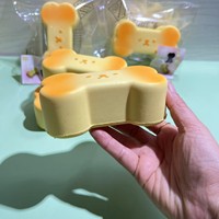 Best-seller : Squishy en PU créatif et mignon, en forme d'os de dessin animé, imitation pain, à rebond lent, doux et moelleux, effet beurre