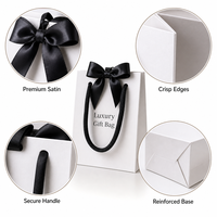 Sac en papier blanc de luxe avec logo personnalisé, ruban en satin noir, emballage cadeau pour boutique, sac de shopping pour mariage ou fête