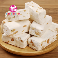Vente en gros Bonbons nougat à l'arachide Bonbons emballage individuel en-cas chinois personnalisés Bonbons mous à mâcher au lait d'arachide