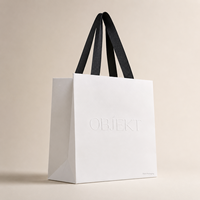 Sac shopping en papier blanc de luxe personnalisé avec poignée noire, logo gaufré à l'aveugle, sac cadeau en papier pour vêtements, bougies, emballages de beauté