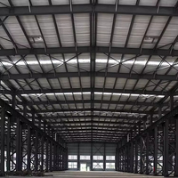 Atelier d'entrepôt industriel en acier résistant à la corrosion avec revêtement ignifuge, isolation phonique et thermique, entretien minimal