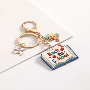 Porte-clés solaire en métal personnalisé et tendance, motif dessin animé, pour la Fête des Enseignants, avec crayon et carnet, idéal comme cadeau pour amis et pour sac à dos scolaire - Product Image 4
