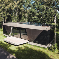 Maison de conteneur préfabriquée en forme de sous-marin multifonctionnel personnalisable à bas prix pour une utilisation en villa Maisons préfabriquées à capsule spatiale
