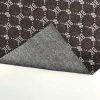 Tissu en denim jacquard noir et gris avec logo rétro en lettres pour vêtements, vestes et sacs