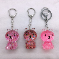 Porte-clés en acrylique transparent en forme d'ours assis, style dessin animé Kawaii, avec paillettes liquides, mignon, pour sac à main, ornement, cadeau