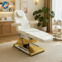 Mobilier de salon de beauté pour esthéticiennes : Lit facial incurvé à base dorée, mécanisme de levage électrique, table de massage à 4 moteurs, lits de luxe pour extensions de cils
