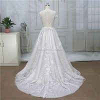 Illusion Luxury Lace Beading Wedding Dress A-Line Robe de mariée à manches courtes avec train court Taille naturelle Longueur au sol avec ceinture