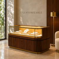 Comptoir de présentation de bijoux sur mesure, vitrine incurvée en verre, cadre doré, vitrine de présentation pour magasin de bijoux, vente en gros