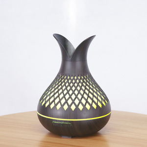 Diffuseur d'arômes à effet bois 500 ml, humidificateur avec grille décorative pour usage domestique, diffuseur d'huiles essentielles avec fonction de minuterie - Product Image 1