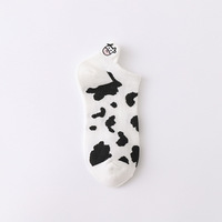 Chaussettes de bateau de dessin animé rayées brodées de vache noire et blanche