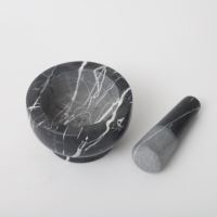Mortier et pilon en granit à prix avantageux avec un ensemble en marbre noir à utiliser en cuisine