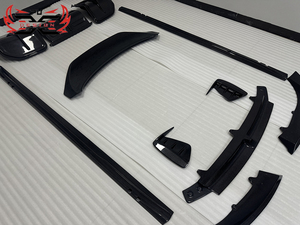 Kit Carrozzeria Stile F in Fibra di Carbonio Secca PU-Design per <span class=keywords><strong>Audi</strong></span> <span class=keywords><strong>E</strong></span>-TRON <span class=keywords><strong>GT</strong></span>: Labbro Anteriore, Presa d'Aria Anteriore, Minigonne Laterali, Diffusore Posteriore, Alettone - Vendita all'Ingrosso - Product Image 5