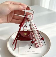 En gros, Mini porte-monnaie mignon en similicuir, porte-clés, breloque de sac à ruban et pompon, pendentif de sac à main vintage, fourniture de bijoux