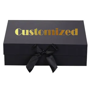 Boîte de vêtements de cadeau de luxe cosmétique pliante magnétique noire de carton avec le logo de feuille d'or en relief