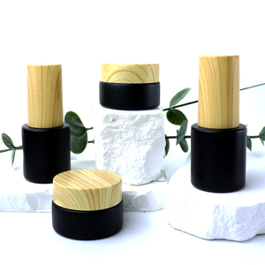 Tarros de vidrio personalizados con acabado mate esmerilado negro de 50g, 30g, 15g, 10g, <span class=keywords><strong>5g</strong></span>, 10ml, 20ml, 50ml con tapas de bambú con textura de madera. - Product Image 3
