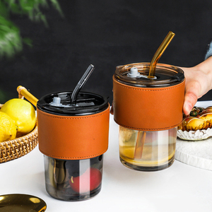 Tazza in Vetro Trasparente Ecologica con Coperchio e Cannuccia, Resistente all'Acqua Bollente, Design Moderno per Caffè Freddo, Tè, Uso Esterno - Product Image 1