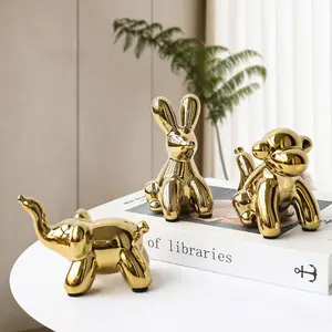 Figuritas de perro en forma de globo para decoración del hogar, ornamento de Interior, escultura de cerámica dorada moderna nórdica, escultura de Animal para dormitorio